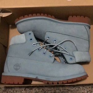 Blue and khaki timberlands